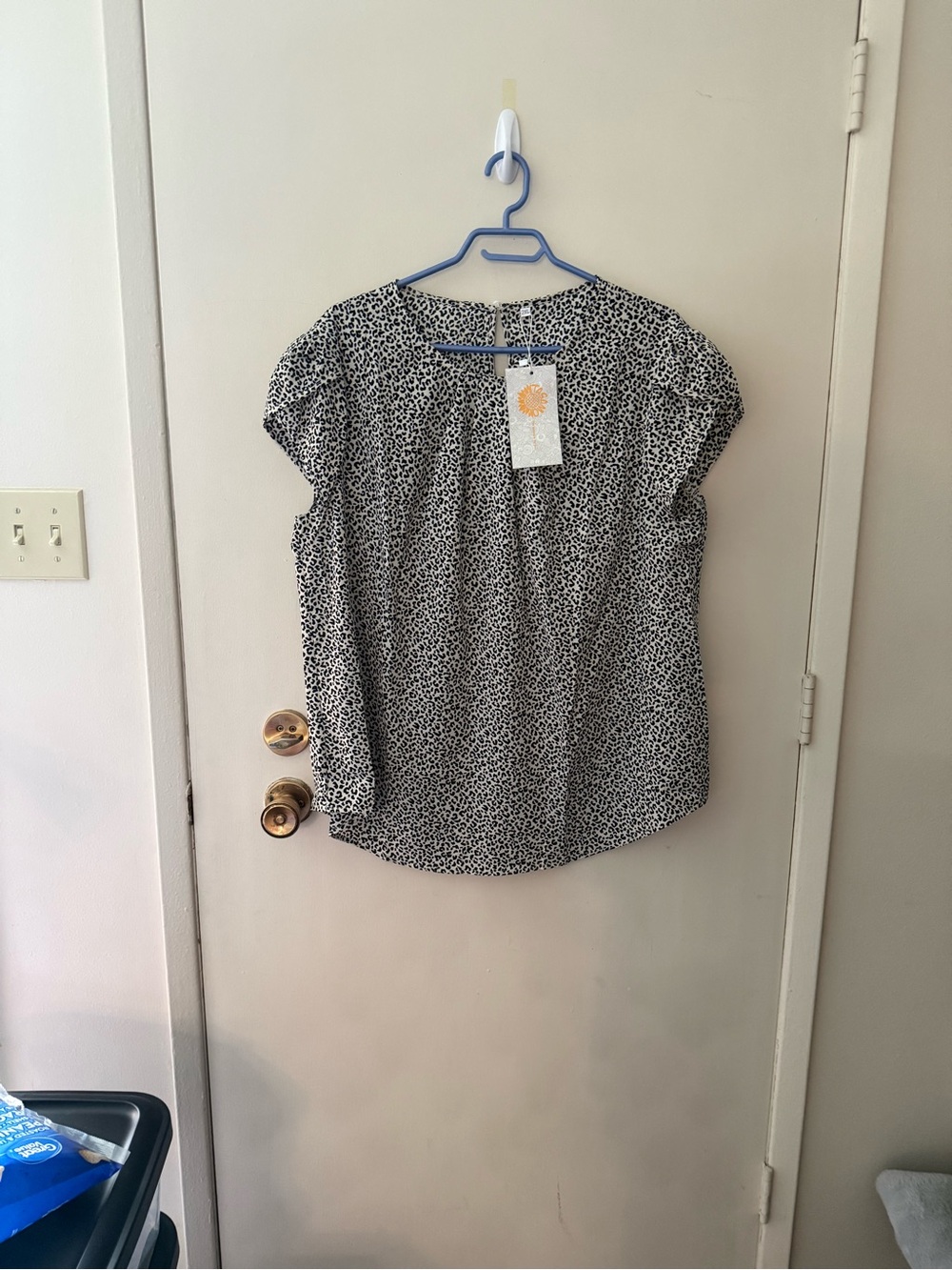 Women’s Black and White Printed Cap Sleeve Blouse
